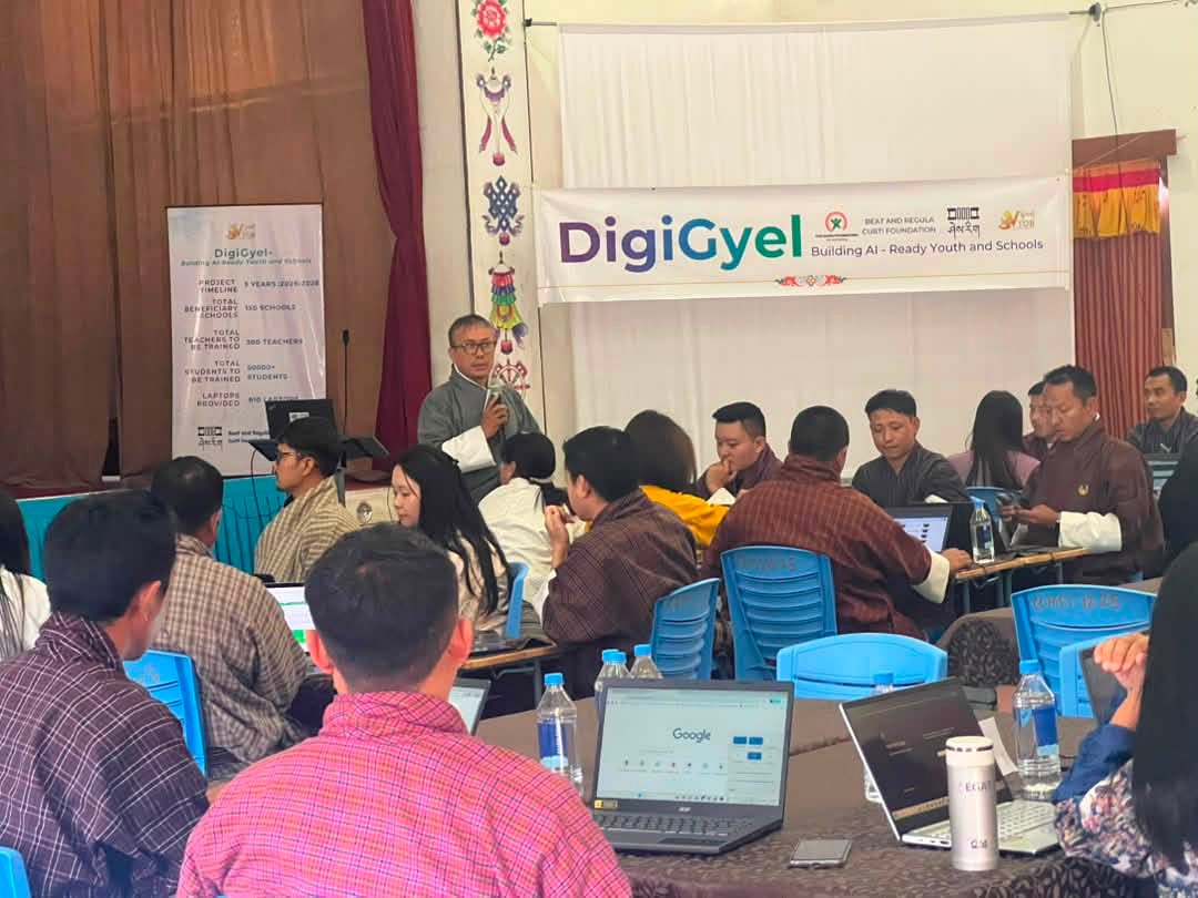 DigiGyel: Building AI-Ready Youth and Schools — Second Batch of Teacher Training Begins!

We have officially begun training our second batch of educators under the DigiGyel Project at Changangkha Middle Secondary School in Thimphu.
This incoming cohort brings together 53 primary and secondary teachers, school leaders, and ICT focal persons representing various Dzongkhags and Thromdes across Bhutan, all stepping forward to prepare their classrooms for a rapidly evolving technological future.
The three-year DigiGyel: Building AI-Ready Youth and Schools (2026–2028) project is led by the VTOB Foundation in close collaboration with the Ministry of Education and Skills Development (MoESD). Funded by The Dariu Foundation with additional support from the Beat and Regula Curti Foundation, the initiative builds on the foundational work of the earlier Digital Literacy Initiative (2022–2025). The goal is to successfully transition Bhutanese schools from basic computing skills into the practical application and understanding of Artificial Intelligence.
The first day focused heavily on orientation, setting key expectations, and mapping out the weekly schedule. During the initial “AI and Me” breakout circles, the 53 participants worked in groups to discuss their current familiarity with digital tools, share their expectations for the training, and explore how AI can be safely integrated into local classrooms. The training then moved smoothly into hands-on sessions covering foundational AI architecture and core concepts.
This marks another important milestone in ensuring our educators are fully equipped with the competencies and practical skills needed to confidently guide the next generation.
A sincere thank you to The Dariu Foundation and the Beat and Regula Curti Foundation for funding this vision, and to MoESD for their continuous partnership and guidance. 🙏