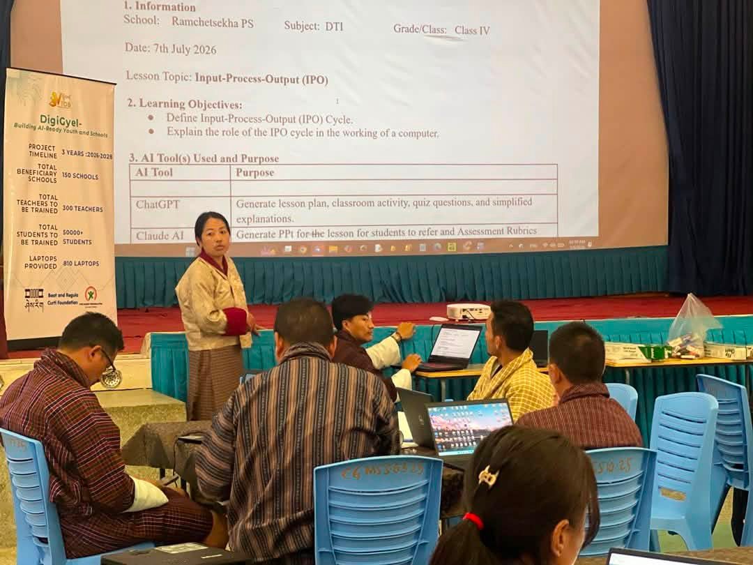 🇧🇹 DigiGyel: Building AI-Ready Youth and Schools — Teacher Training Begins!

On 4th July 2025, we kicked off the first cohort of teacher training for the DigiGyel Project at Changangkha Middle Secondary School, Thimphu. 

47 teachers — primary and secondary educators, ICT focal teachers, and school leaders — gathered from Dzongkhags and Thromdes across Bhutan to begin a journey that matters deeply for the future of our classrooms and our country.

DigiGyel: Building AI-Ready Youth and Schools (2026–2028) is a three-year initiative led by the VTOB Foundation, in close collaboration with the Ministry of Education and Skills Development (MoESD). Funded by The Dariu Foundation, with additional support from the Beat and Regula Curti Foundation, it builds directly on the Digital Literacy Initiative (2022–2025) — supporting the transition for Bhutanese schools from basic computer skills into the world of Artificial Intelligence. Over three years, this project will train 600 teachers across 500 + schools, establish AI Clubs, equip schools with 810 laptops, and ultimately reach 50,000 students with foundational AI literacy.

The day opened with orientation by our resource persons — Mr. Mani Wangdi, Mr. Thinley, and Mr. Sonam Tshering — who walked participants through the training objectives and weekly schedule. The “AI and Me” session followed, where teachers worked in groups to share their current experiences with technology, their hopes for the course, and their ideas on bringing AI into Bhutanese classrooms. The afternoon moved into hands-on foundational AI sessions.

The goal is simple and urgent: ensure Bhutan’s next generation understands AI — not just as users, but as thinkers, problem-solvers, and creators.

A heartfelt thank you to The Dariu Foundation and the Beat and Regula Curti Foundation for funding this vision, and to MoESD for their support and guidance in making it happen. 🙏

The Dariu Foundation Sherig Bhutan