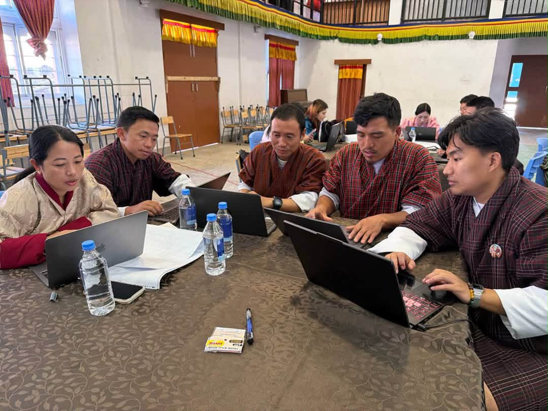 🇧🇹 DigiGyel: Building AI-Ready Youth and Schools — Teacher Training Begins!

On 4th July 2025, we kicked off the first cohort of teacher training for the DigiGyel Project at Changangkha Middle Secondary School, Thimphu. 

47 teachers — primary and secondary educators, ICT focal teachers, and school leaders — gathered from Dzongkhags and Thromdes across Bhutan to begin a journey that matters deeply for the future of our classrooms and our country.

DigiGyel: Building AI-Ready Youth and Schools (2026–2028) is a three-year initiative led by the VTOB Foundation, in close collaboration with the Ministry of Education and Skills Development (MoESD). Funded by The Dariu Foundation, with additional support from the Beat and Regula Curti Foundation, it builds directly on the Digital Literacy Initiative (2022–2025) — supporting the transition for Bhutanese schools from basic computer skills into the world of Artificial Intelligence. Over three years, this project will train 600 teachers across 500 + schools, establish AI Clubs, equip schools with 810 laptops, and ultimately reach 50,000 students with foundational AI literacy.

The day opened with orientation by our resource persons — Mr. Mani Wangdi, Mr. Thinley, and Mr. Sonam Tshering — who walked participants through the training objectives and weekly schedule. The “AI and Me” session followed, where teachers worked in groups to share their current experiences with technology, their hopes for the course, and their ideas on bringing AI into Bhutanese classrooms. The afternoon moved into hands-on foundational AI sessions.

The goal is simple and urgent: ensure Bhutan’s next generation understands AI — not just as users, but as thinkers, problem-solvers, and creators.

A heartfelt thank you to The Dariu Foundation and the Beat and Regula Curti Foundation for funding this vision, and to MoESD for their support and guidance in making it happen. 🙏

The Dariu Foundation Sherig Bhutan