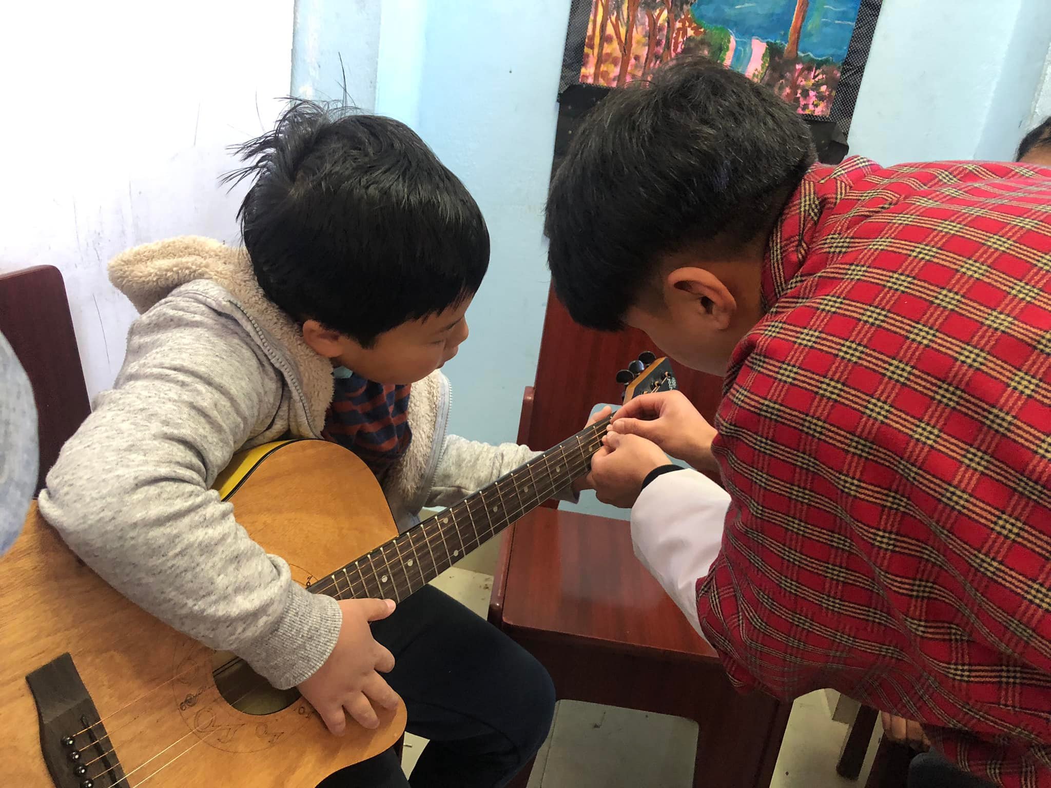 Updates on Guitar class by Mr. Karma Gyendhen Chophel (guitarist, composer, and singer). Additionally, his passion in photography and videography has been advantageous for the children in imparting the ideas.
The participants are having good learning experiences.
Recently his first debut song was released and interested individuals can check it out from the links through various platforms such as YouTube, Spotify, and soundcloud.
VTOB Foundation extends its support and is committed in collaboration with youths for the benefits of youths as a whole.
Official Music Video
https://youtu.be/gmAjpdB3zjQ?si=k0dB_eRutPQBTKEj
https://open.spotify.com/album/7Cy7HWxdFXpPOEux426U6j?si=4IioH46lQWmzuIkNJ54KVw
https://on.soundcloud.com/qy1vd8hbMfFnknG79
https://youtube.com/@Gyendhen?si=5_LzelKzHu0PoU7w
