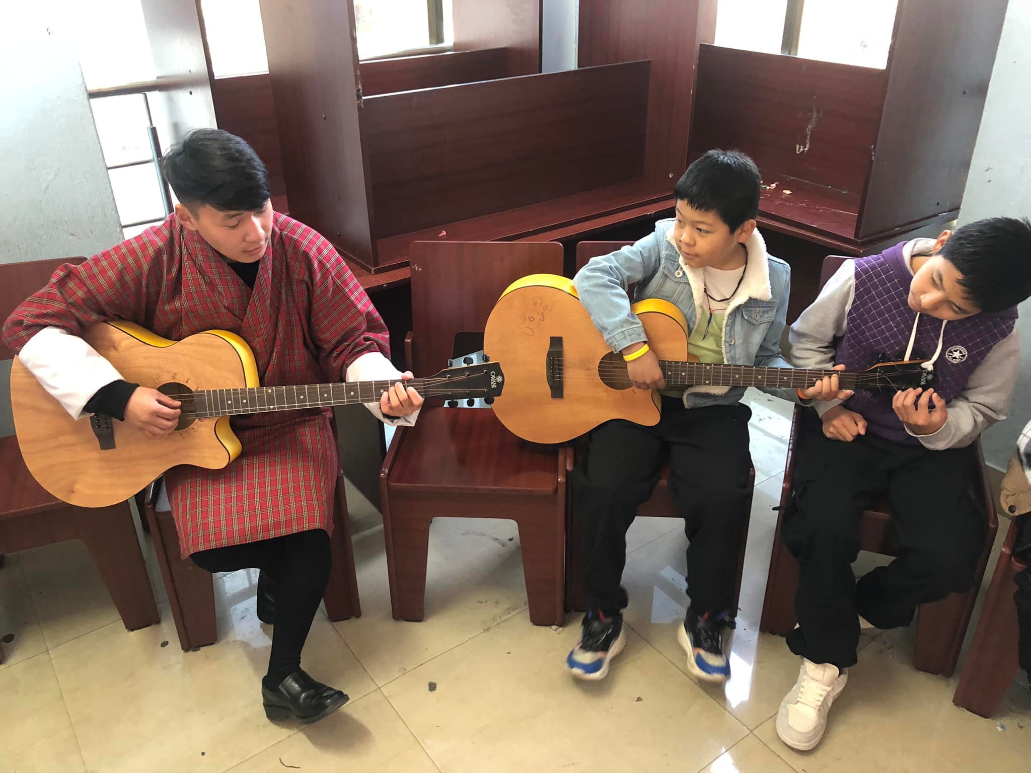 Updates on Guitar class by Mr. Karma Gyendhen Chophel (guitarist, composer, and singer). Additionally, his passion in photography and videography has been advantageous for the children in imparting the ideas.
The participants are having good learning experiences.
Recently his first debut song was released and interested individuals can check it out from the links through various platforms such as YouTube, Spotify, and soundcloud.
VTOB Foundation extends its support and is committed in collaboration with youths for the benefits of youths as a whole.
Official Music Video
https://youtu.be/gmAjpdB3zjQ?si=k0dB_eRutPQBTKEj
https://open.spotify.com/album/7Cy7HWxdFXpPOEux426U6j?si=4IioH46lQWmzuIkNJ54KVw
https://on.soundcloud.com/qy1vd8hbMfFnknG79
https://youtube.com/@Gyendhen?si=5_LzelKzHu0PoU7w